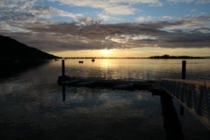 Sunset from the dock of the Kasistna Bay Lab. Photo: Amanda Kelley.